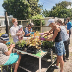 A group of volunteers gathered around on 'Weeding Wednesday'